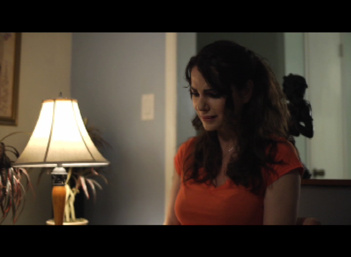 Actress Daniela Torchia, playing Lucy.